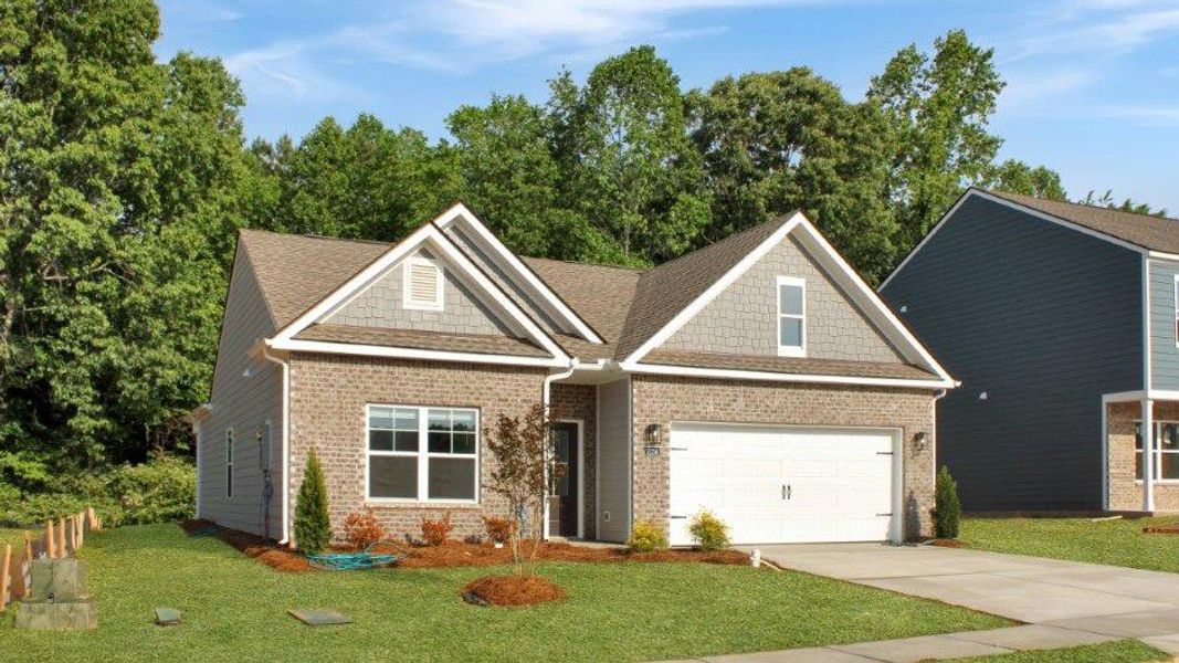 Front exterior of a new home in Fairview Hills, Cleveland, TN, highlighting curb appeal (Image 2).