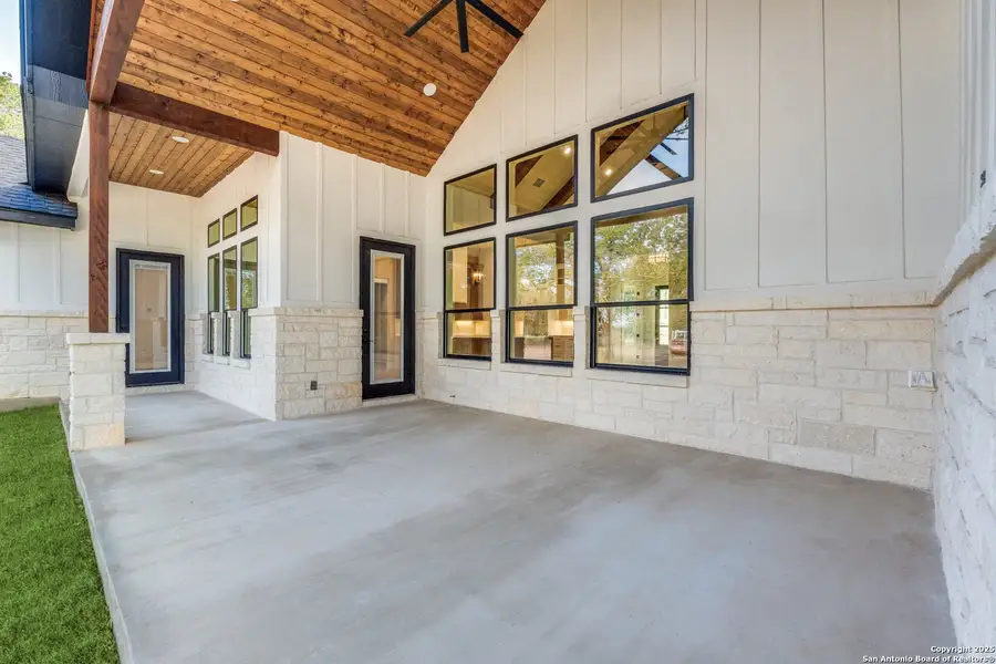 Exterior details and patio area of a home in , Adkins (Image 1).