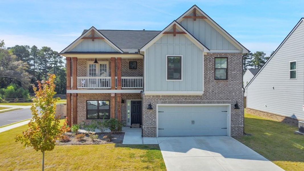 Front exterior of a new home in , Powder Springs, GA, highlighting curb appeal (Image 25).