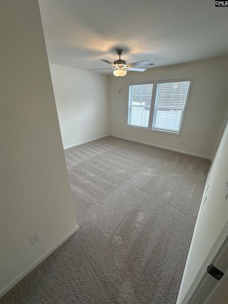 Spacious, unfurnished interior of a new home in Piney Woods Bluff, Columbia (Image 15).