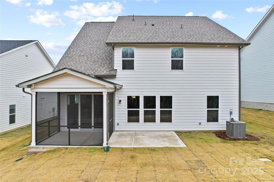 Exterior details and patio area of a home in Forest Creek, Waxhaw (Image 23).