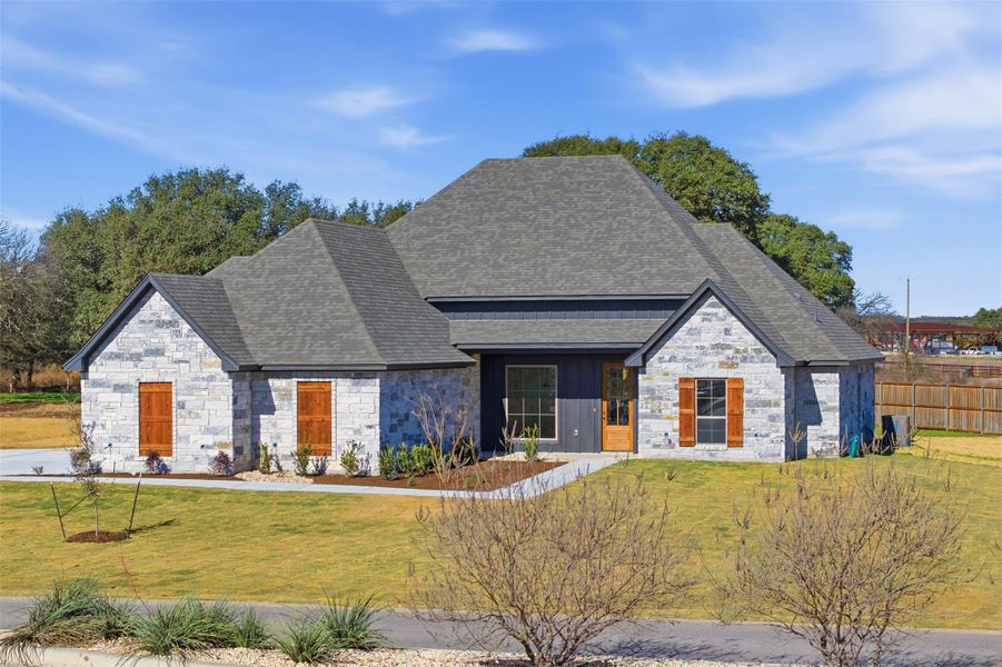 Front exterior of a new home in Eagle Ranch, Salado, TX, highlighting curb appeal (Image 7).
