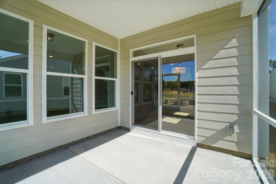 Exterior details and patio area of a home in Heritage - 55+ Community, Indian Trail (Image 23).