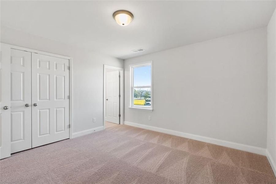 Spacious, unfurnished interior of a new home in Wehunt Meadows, Hoschton (Image 114).