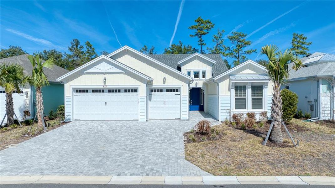 Front exterior of a new home in , Daytona Beach, FL, highlighting curb appeal (Image 32).