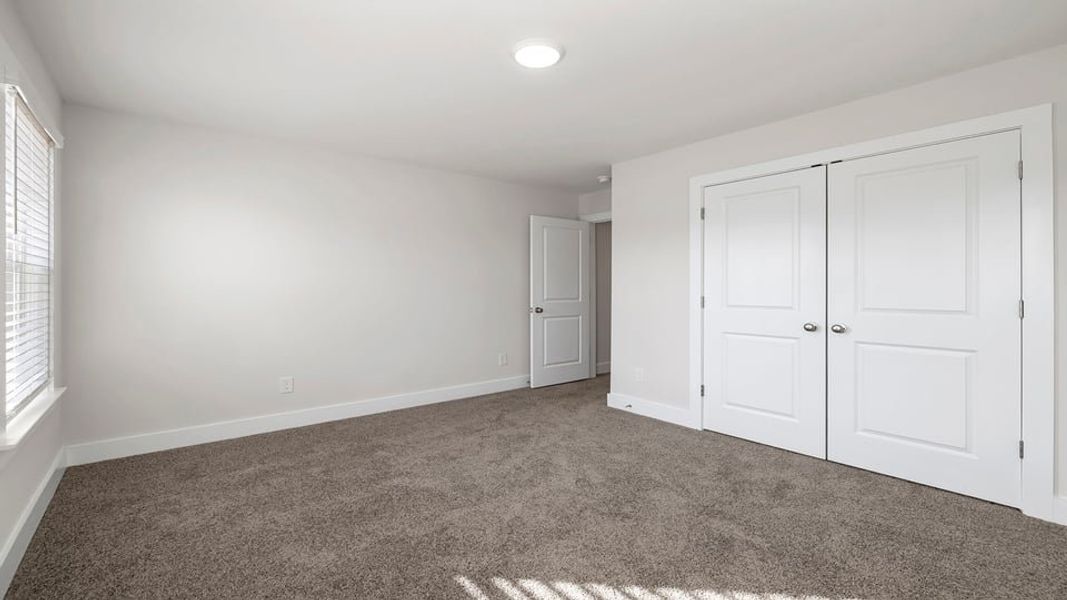 Representative unfurnished interior of a home built from the Phoenix by D.R. Horton in Edgewood Estates, Greenville (Image 19).