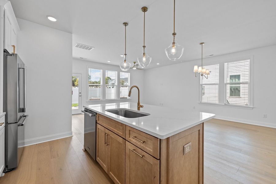 Representative furnished interior of a home built from the The Juniper by RobuckHomes in Kennebec Crossing, Angier (Image 10).