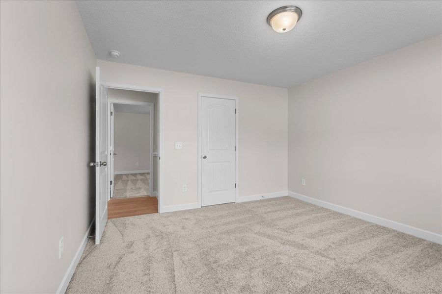 Spacious, unfurnished interior of a new home in Fall Creek, Inman (Image 19).
