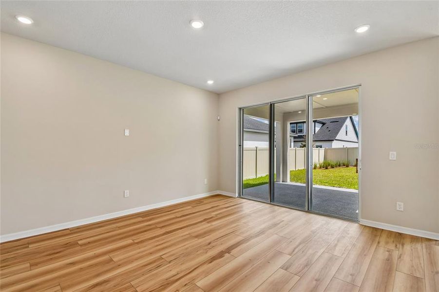 Spacious, unfurnished interior of a new home in Oakfield at Mount Dora Cottage Series, Mount Dora (Image 18).