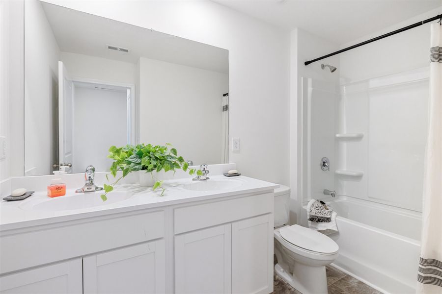 Representative furnished interior of a home built from the Belhaven by D.R. Horton in The Ridge at Neals Landing, Knoxville (Image 24).