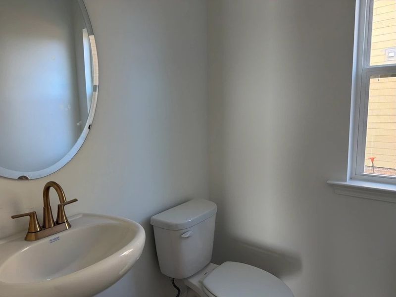 1/2 Bath featuring the AW Collection® Sapphire - Petite but powerful with bold design.