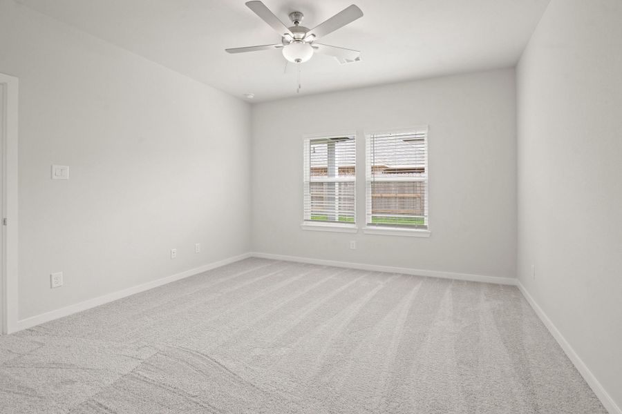 Spacious, unfurnished interior of a new home in Sunterra, Katy (Image 11).