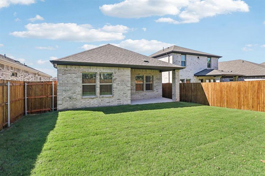 Exterior details and patio area of a home in Eastridge - Spring Series, McKinney (Image 4). Exterior details and patio area of a home in Eastridge - Spring Series, McKinney (Image 4).