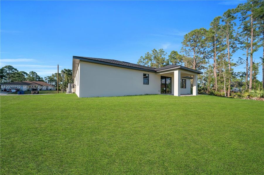 Exterior details and patio area of a home in , Lehigh Acres (Image 34).