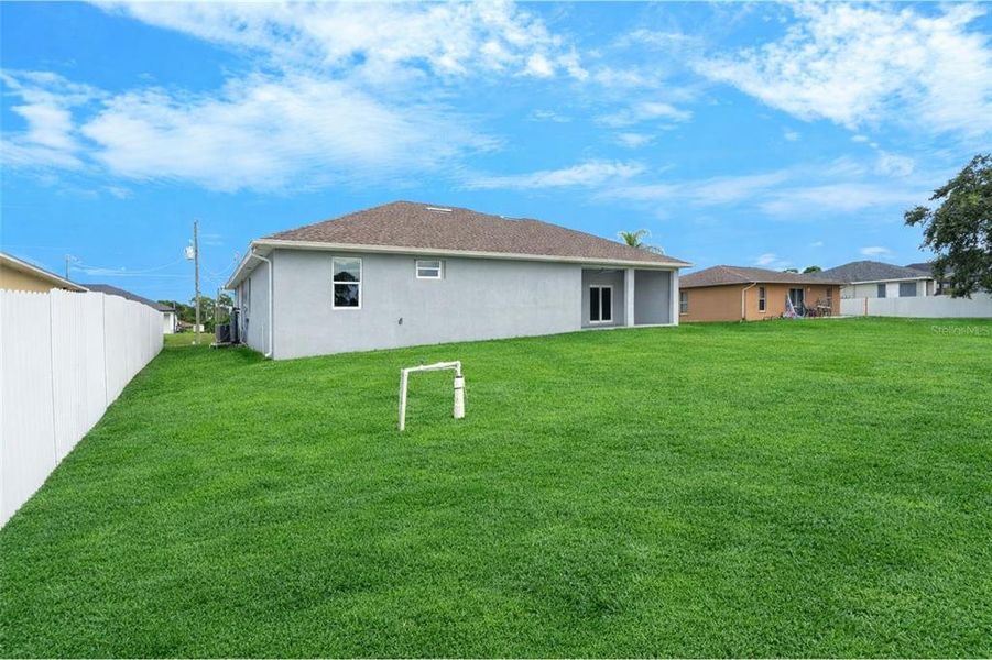 Exterior details and patio area of a home in , Lehigh Acres (Image 4).
