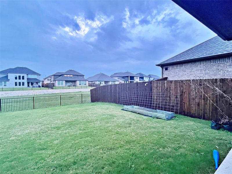 Exterior details and patio area of a home in Northlake Estates 65s, Little Elm (Image 3).