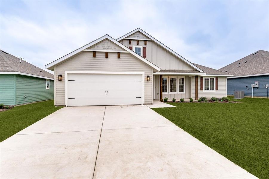 Front exterior of a new home in , Whitesboro, TX, highlighting curb appeal (Image 18). Front exterior of a new home in , Whitesboro, TX, highlighting curb appeal (Image 18).