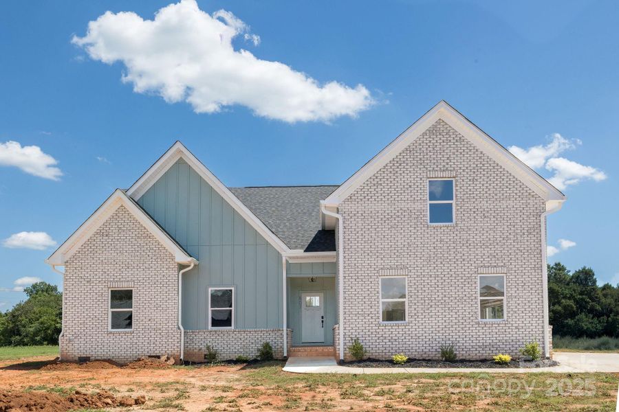 Front exterior of a new home in , Statesville, NC, highlighting curb appeal (Image 13).