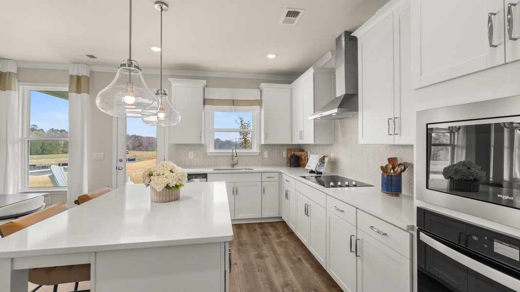 Representative furnished interior of a home built from the Savannah by D.R. Horton in Evergreen Crossing, Locust Grove (Image 11).