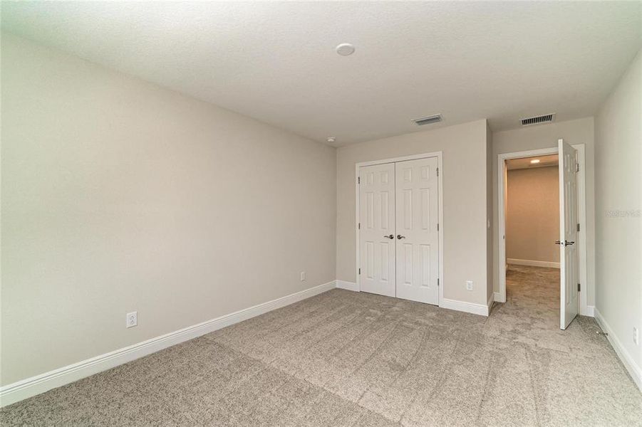 Spacious, unfurnished interior of a new home in Pasadena Woods, Wesley Chapel (Image 42).