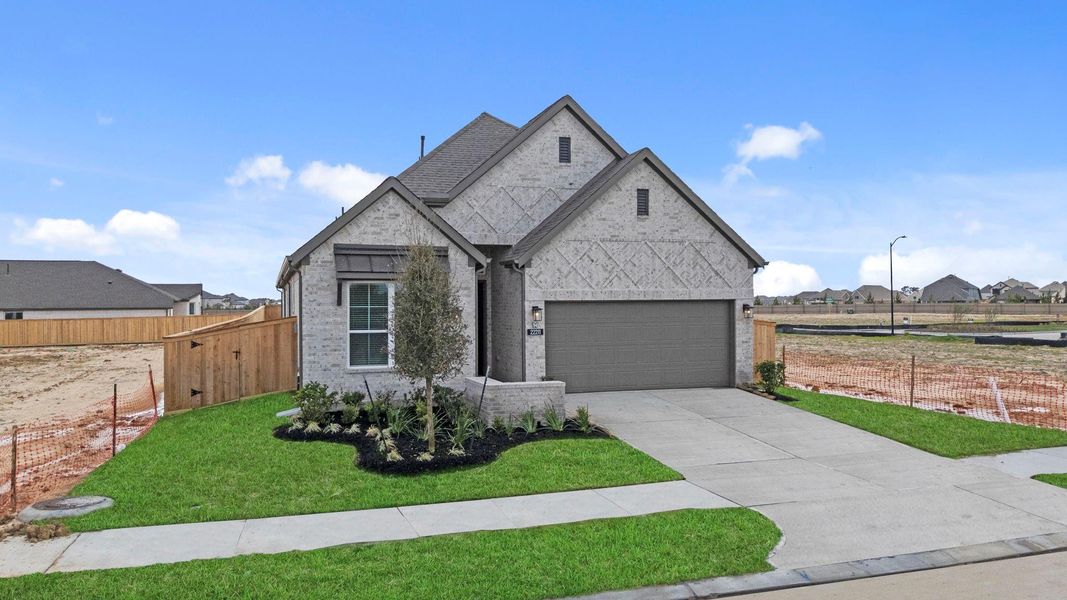 Front exterior of a new home in Bridgeland, Cypress, TX, highlighting curb appeal (Image 18).