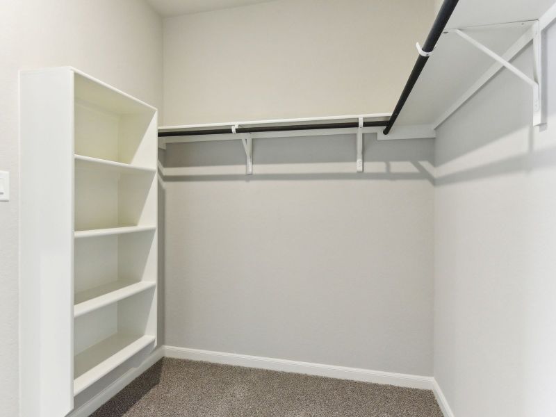 Primary suite walk-in closet in the Matador floorplan at a Meritage Homes community.