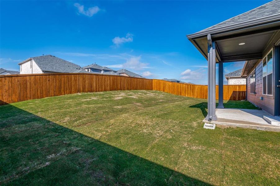 View of yard with a patio area