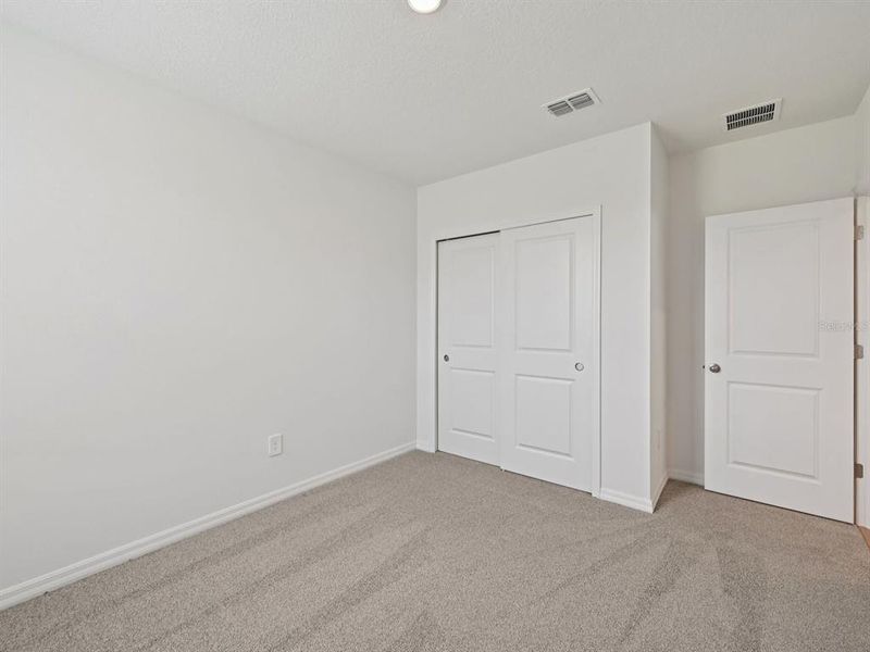 Spacious, unfurnished interior of a new home in The Reserve at Van Oaks, Auburndale (Image 14).