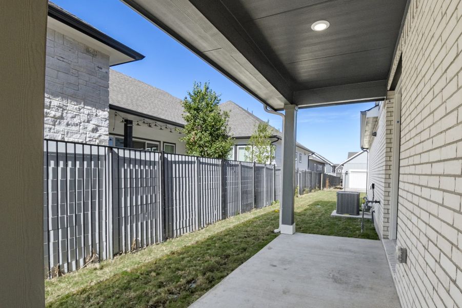 Exterior details and patio area of a home in Easton Park, Austin (Image 34).