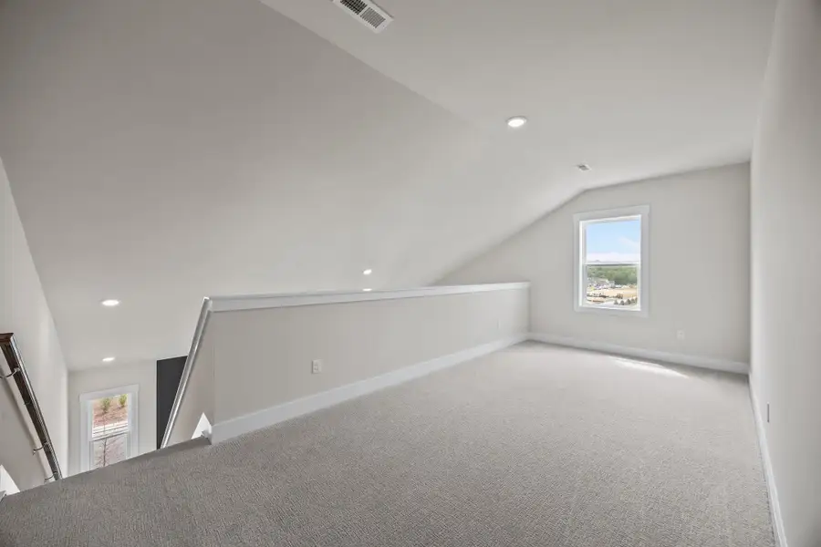 Representative unfurnished interior of a home built from the Red Rocks by Garman Homes in Allen Park, Raleigh (Image 15).