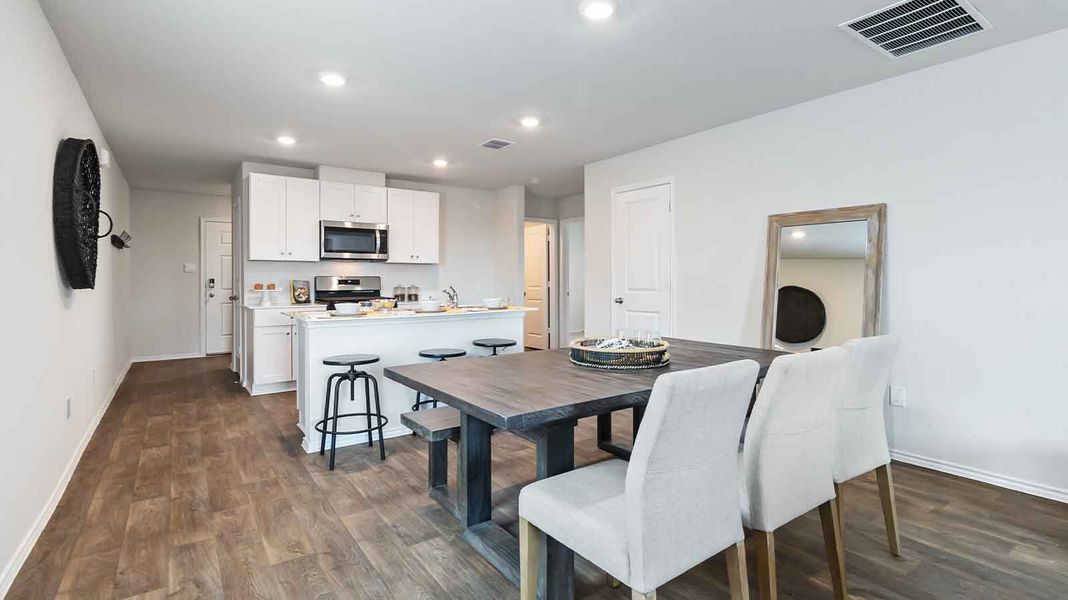Representative furnished interior of a home built from the Barton by D.R. Horton in Watermark, Alvin (Image 4).