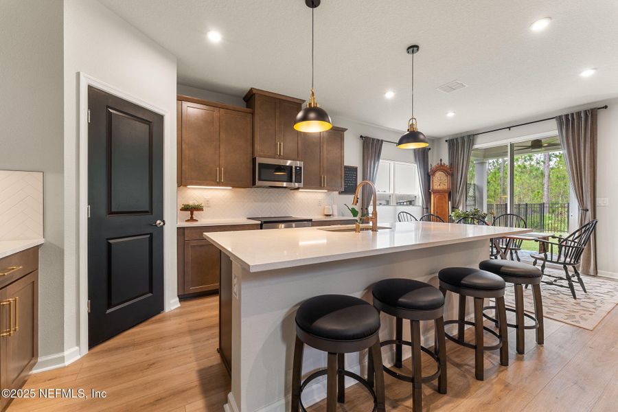 Furnished interior view inside a new home in Seminole Palms Single-Family Homes, Palm Coast (Image 44).