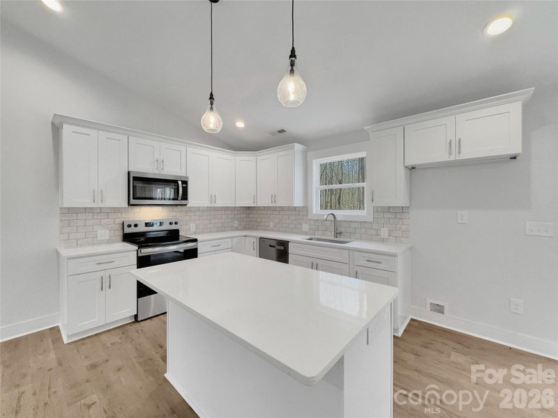 Island offers extra seating Island offers extra seating