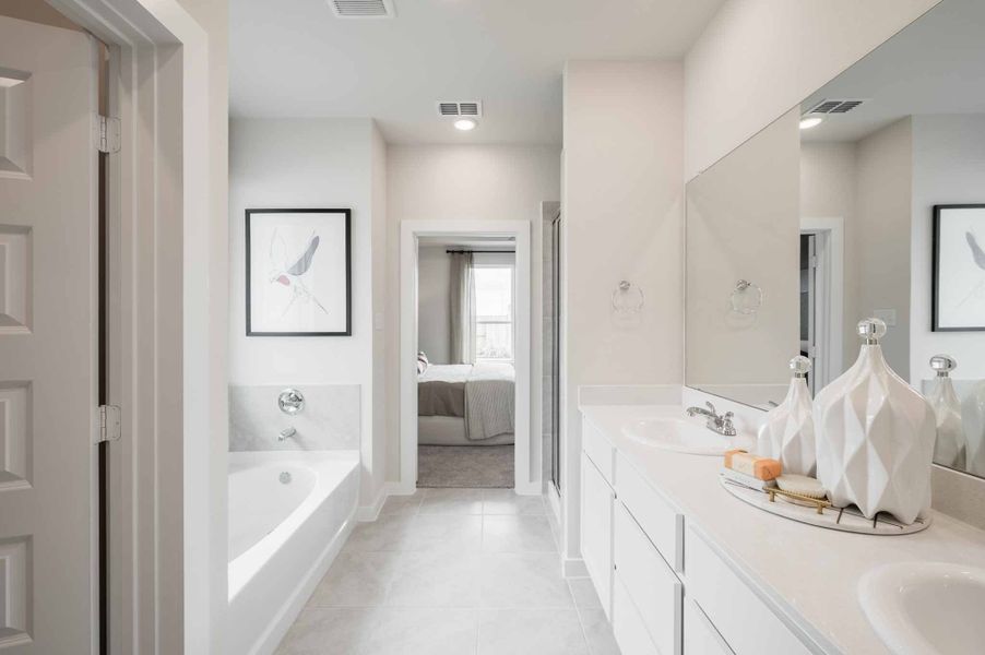 Furnished interior view inside a new home in The Cove at Mason Woods, Cypress (Image 17). Furnished interior view inside a new home in The Cove at Mason Woods, Cypress (Image 17).