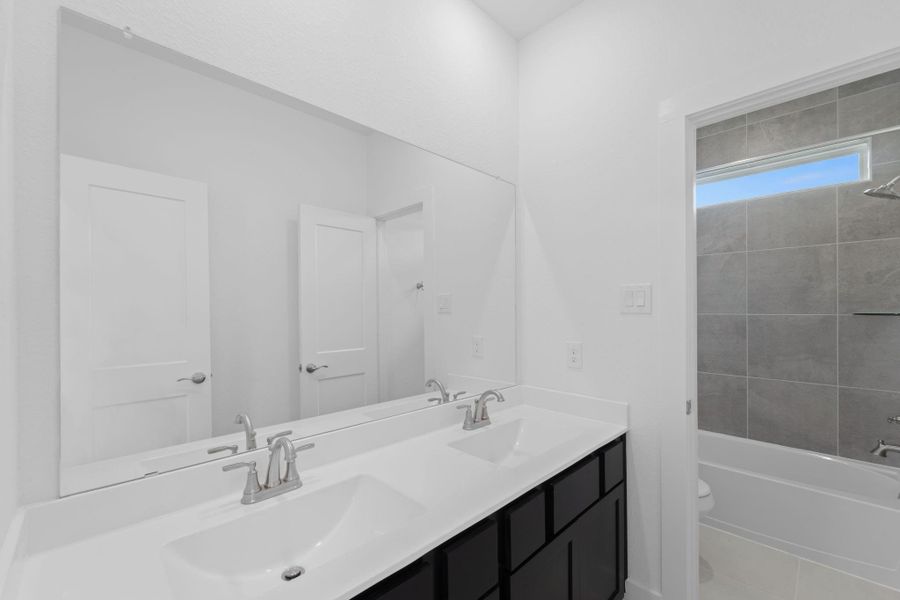 Furnished interior view inside a new home in Meridiana, Iowa Colony (Image 11). Furnished interior view inside a new home in Meridiana, Iowa Colony (Image 11).