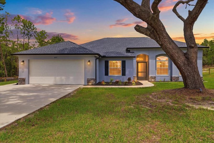 Front exterior of a new home in , Beverly Hills, FL, highlighting curb appeal (Image 25). Front exterior of a new home in , Beverly Hills, FL, highlighting curb appeal (Image 25).