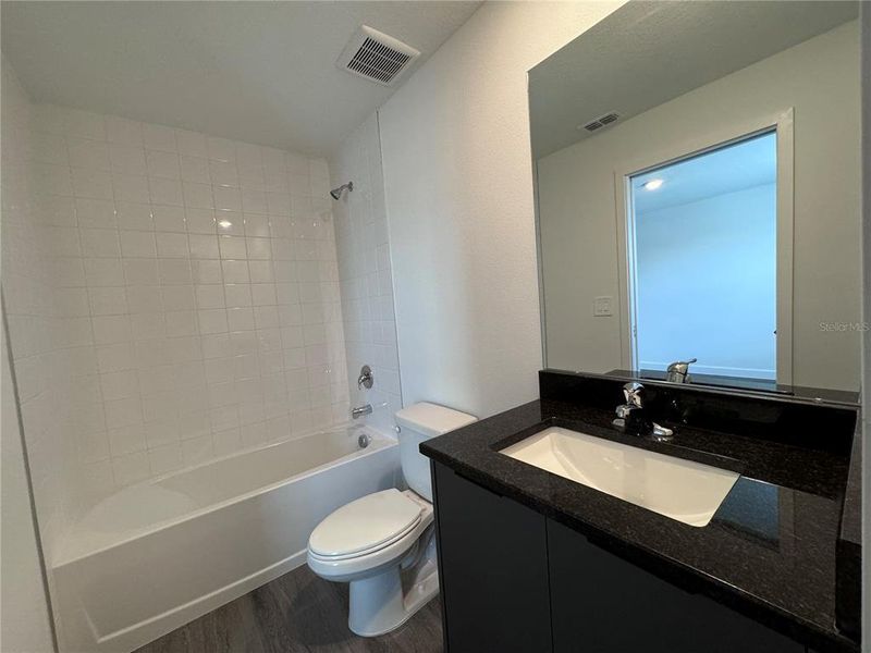Furnished interior view inside a new home in , Kissimmee (Image 7).