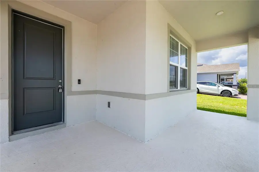 Exterior details and patio area of a home in , Apopka (Image 3).