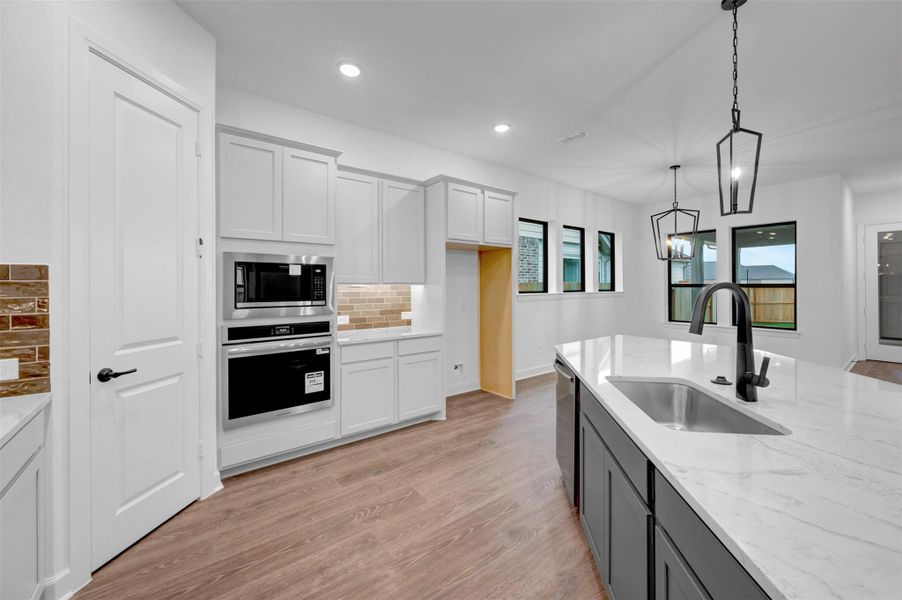 Furnished interior view inside a new home in Riceland 50’ Alley Load Homesites, Mont Belvieu (Image 12).