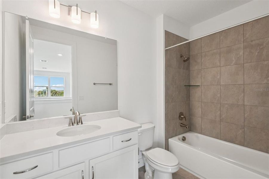 Furnished interior view inside a new home in Lagoon Residences at Epperson, Wesley Chapel (Image 5).