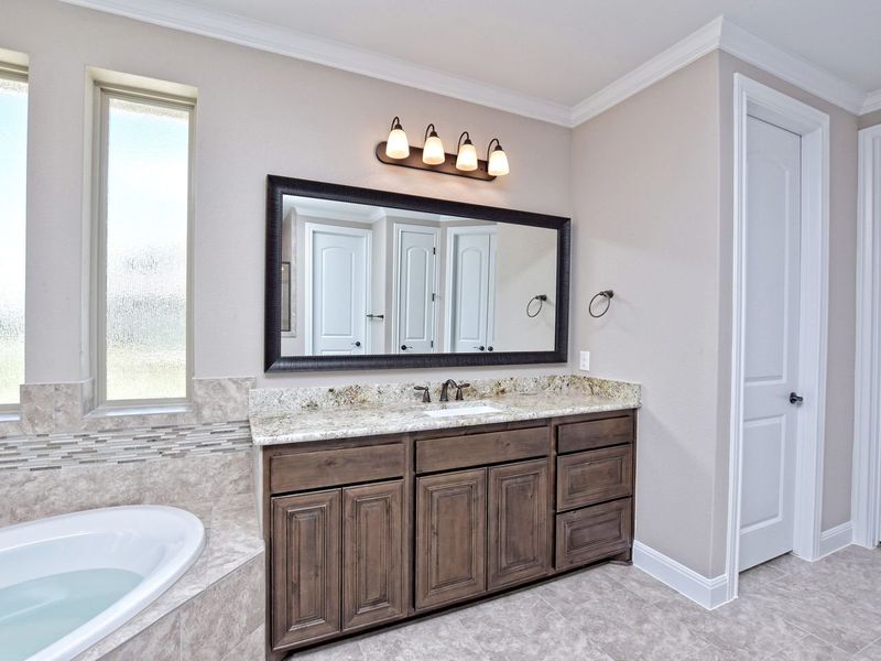 Representative furnished interior of a home built from the San Simeon I by Giddens Homes in Clearwater Ranch, Liberty Hill (Image 265).