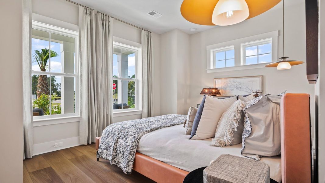 Furnished interior view inside a new home in Summerwind Crossing at Lakes of Cane Bay, Summerville (Image 5).