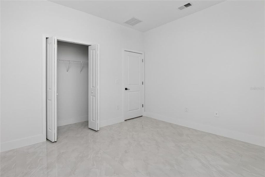 Spacious, unfurnished interior of a new home in , Port Charlotte (Image 53).