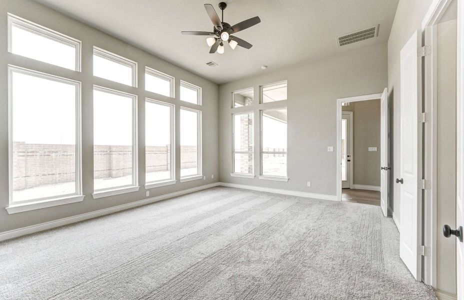 Representative unfurnished interior of a home built from the 2870 by Ravenna Homes in The Woodlands Hills 65′, Willis (Image 30). Representative unfurnished interior of a home built from the 2870 by Ravenna Homes in The Woodlands Hills 65′, Willis (Image 30).