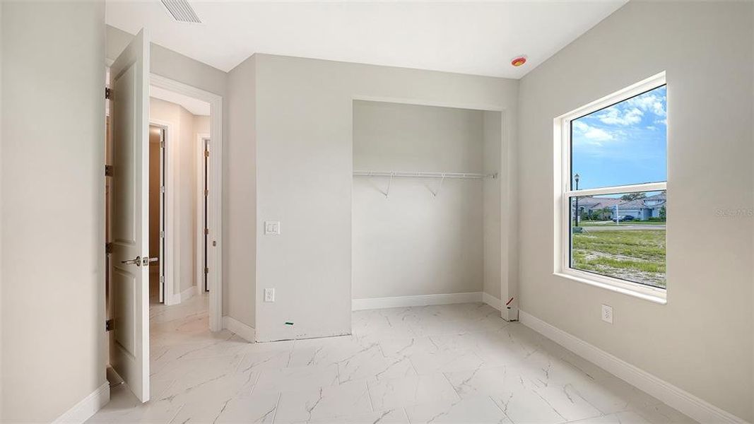 Spacious, unfurnished interior of a new home in Grand Park, Sarasota (Image 36). Spacious, unfurnished interior of a new home in Grand Park, Sarasota (Image 36).