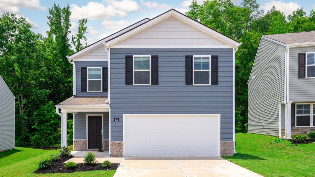 Front exterior of a new home in Hawk's Ridge, Rossville, GA, highlighting curb appeal (Image 1). Front exterior of a new home in Hawk's Ridge, Rossville, GA, highlighting curb appeal (Image 1).