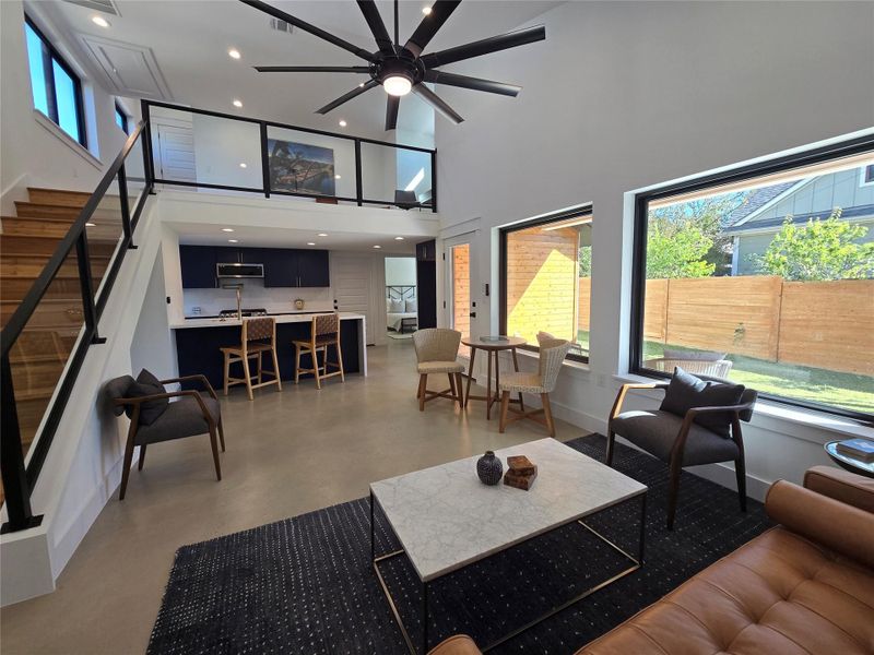 Huge fan in the living space for moving air, and massive windows to the private back yard. Huge fan in the living space for moving air, and massive windows to the private back yard.