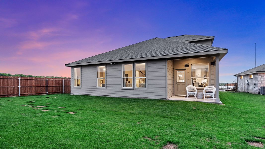 Exterior details and patio area of a home in Bluestem, Rhome (Image 2).