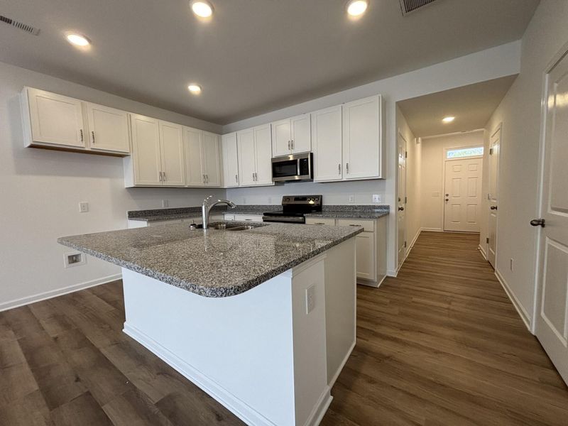 Furnished interior view inside a new home in CraigStone, Woodruff (Image 4).