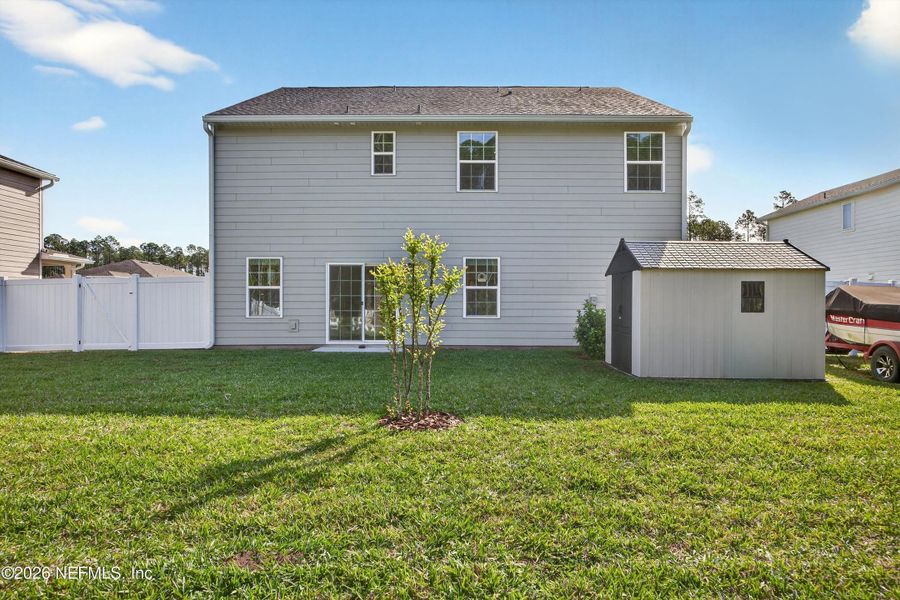 Exterior details and patio area of a home in Terra Pines, St. Augustine (Image 21).
